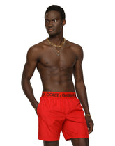 Mid-length swim trunks with branded stretch waistband - | Dolce & Gabbana