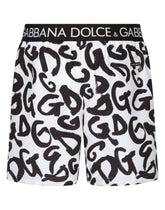 Mid-length swim trunks with all-over DG logo print - | Dolce & Gabbana