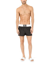 Two-tone short swim trunks with DG patch - | Dolce & Gabbana