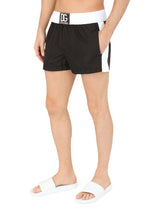 Two-tone short swim trunks with DG patch - | Dolce & Gabbana
