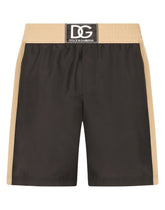 Two-tone mid-length swim trunks with DG patch - | Dolce & Gabbana