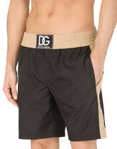 Two-tone mid-length swim trunks with DG patch - | Dolce & Gabbana
