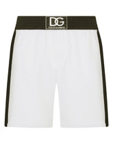 Two-tone mid-length swim trunks with DG patch - | Dolce & Gabbana