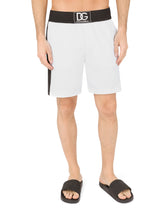Two-tone mid-length swim trunks with DG patch - | Dolce & Gabbana