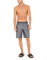 Mid-length swim trunks with metal DG logo - | Dolce & Gabbana