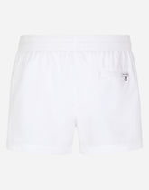 Short swim trunks with DG logo band - | Dolce & Gabbana