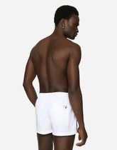 Short swim trunks with DG logo band - | Dolce & Gabbana