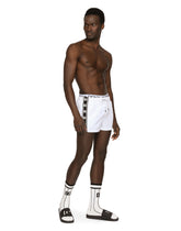 Short swim trunks with DG logo band - | Dolce & Gabbana