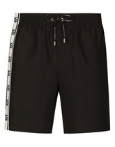 Mid-length swim trunks with DG logo band - | Dolce & Gabbana