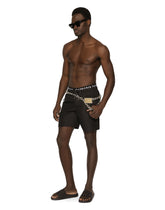 Mid-length swim trunks with DG logo band - | Dolce & Gabbana