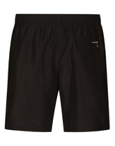 Mid-length swim trunks with DG logo band - | Dolce & Gabbana