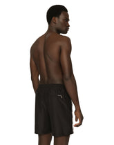Mid-length swim trunks with DG logo band - | Dolce & Gabbana