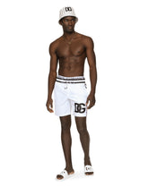 Mid-length swim trunks with DG patch - | Dolce & Gabbana