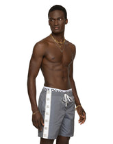 Mid-length swim trunks with branded bands - | Dolce & Gabbana