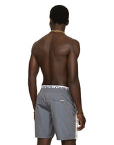 Mid-length swim trunks with branded bands - | Dolce & Gabbana
