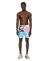 Mid-length swim trunks with spray-paint graffiti print - | Dolce & Gabbana