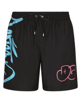 Mid-length swim trunks with spray-paint DG print - | Dolce & Gabbana