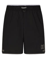 Mid-length swim trunks with DG logo patch - | Dolce & Gabbana