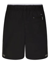 Mid-length swim trunks with DG logo patch - | Dolce & Gabbana