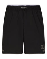 Mid-length swim trunks with DG logo patch - | Dolce & Gabbana