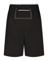 Long swim trunks with DG logo band - | Dolce & Gabbana