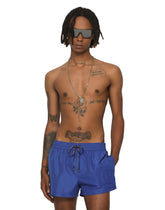 Short swim trunks with embossed DG logo - | Dolce & Gabbana