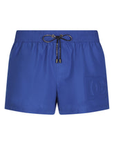 Short swim trunks with embossed DG logo - | Dolce & Gabbana