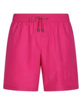 Mid-length swim trunks with embossed DG logo - | Dolce & Gabbana