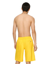 Long-leg swim trunks with embossed DG logo - | Dolce & Gabbana