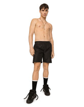 Mid-length swim trunks with logo tag - | Dolce & Gabbana