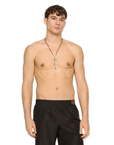 Mid-length swim trunks with logo tag - | Dolce & Gabbana