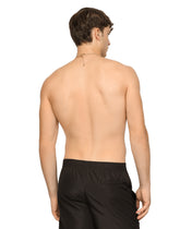 Mid-length swim trunks with logo tag - | Dolce & Gabbana