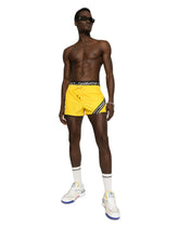 Short swim trunks with branded band - | Dolce & Gabbana