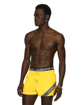 Short swim trunks with branded band - | Dolce & Gabbana