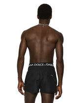 Short swim trunks with branded band - | Dolce & Gabbana