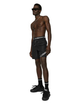Mid-length swim trunks with branded band - | Dolce & Gabbana