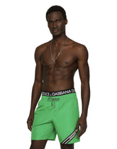Mid-length swim trunks with branded band - | Dolce & Gabbana