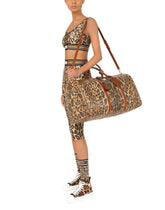 Medium travel bag in leo crepe with logo plaque -  | Dolce &amp; Gabbana