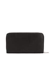 Zip-around calfskin wallet with raised logo -  | Dolce &amp; Gabbana