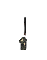 Nylon multi-purpose kit with leopard print against a green background and branded plate -  | Dolce & Gabbana