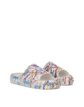 Beachwear sliders with color splash print -  | Dolce & Gabbana