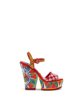 PATENT LEATHER SANDALS WITH WEDGE HEEL AND SICILIAN CARRETTO PRINT -  | Dolce & Gabbana