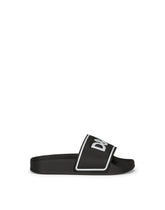 Rubber and calfskin sliders with logo print -  | Dolce & Gabbana