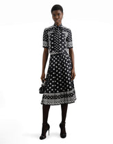 Pleated longuette skirt in silk twill with allover DG logo scarf print -  | Dolce &amp; Gabbana