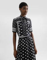 Short-sleeved silk blouse with pussy-bow and all-over DG logo scarf print -  | Dolce &amp; Gabbana