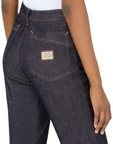 Flared jeans with tobacco-colored stitching -  | Dolce &amp; Gabbana