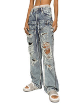KIM DOLCE&amp;GABBANA Patchwork denim jeans with ripped details -  | Dolce &amp; Gabbana
