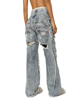 KIM DOLCE&amp;GABBANA Patchwork denim jeans with ripped details -  | Dolce &amp; Gabbana