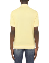 Cotton piqué polo shirt with branded plate -  | Dolce & Gabbana