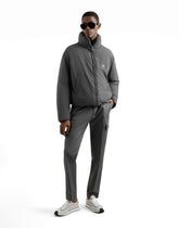 Padded technical fabric jacket with a high neck and tag -  | Dolce &amp; Gabbana